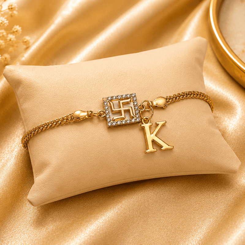 Personalized Golden Swastik Rakhi with Initial
